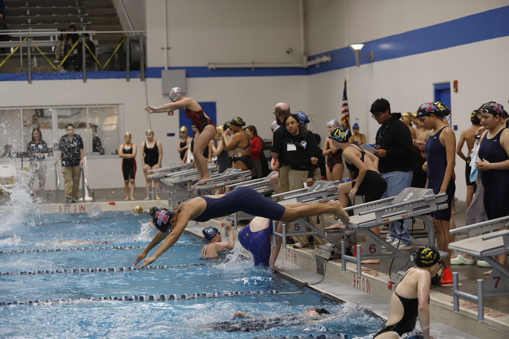 Burges, Jefferson Silva, and Irvin High School student athletes swimming