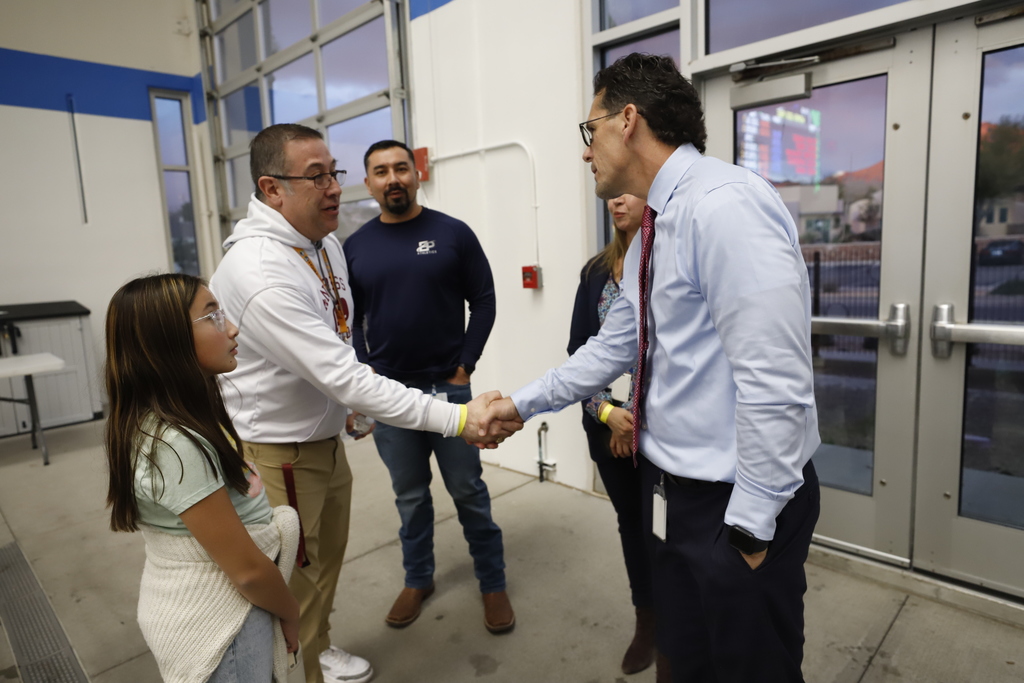 Andress High School Principal shakes hand with Superintendent Dr. Brian Lusk