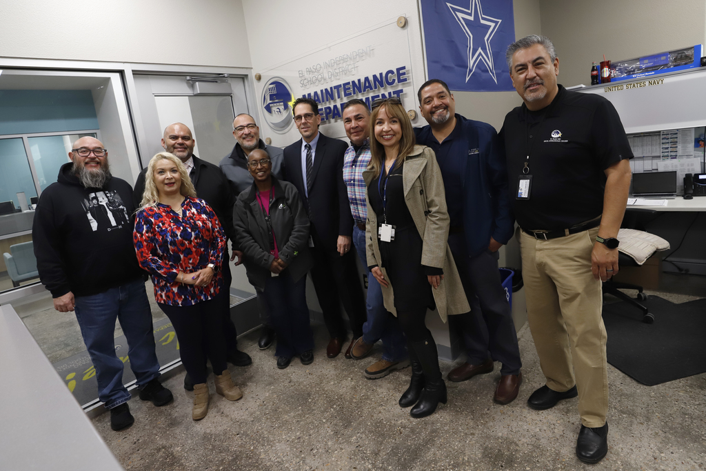 Superintendent Dr. Brian Lusk and staff take group photo