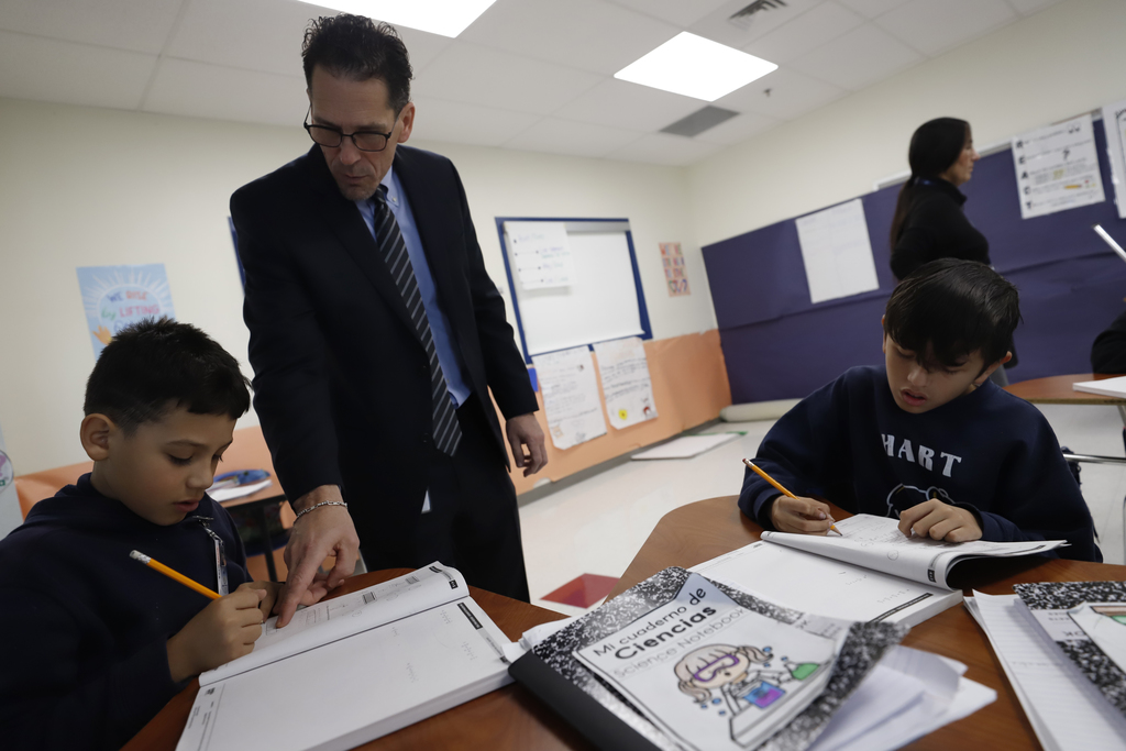 El Paso ISD Superintendent working with students at Hart Elementary School