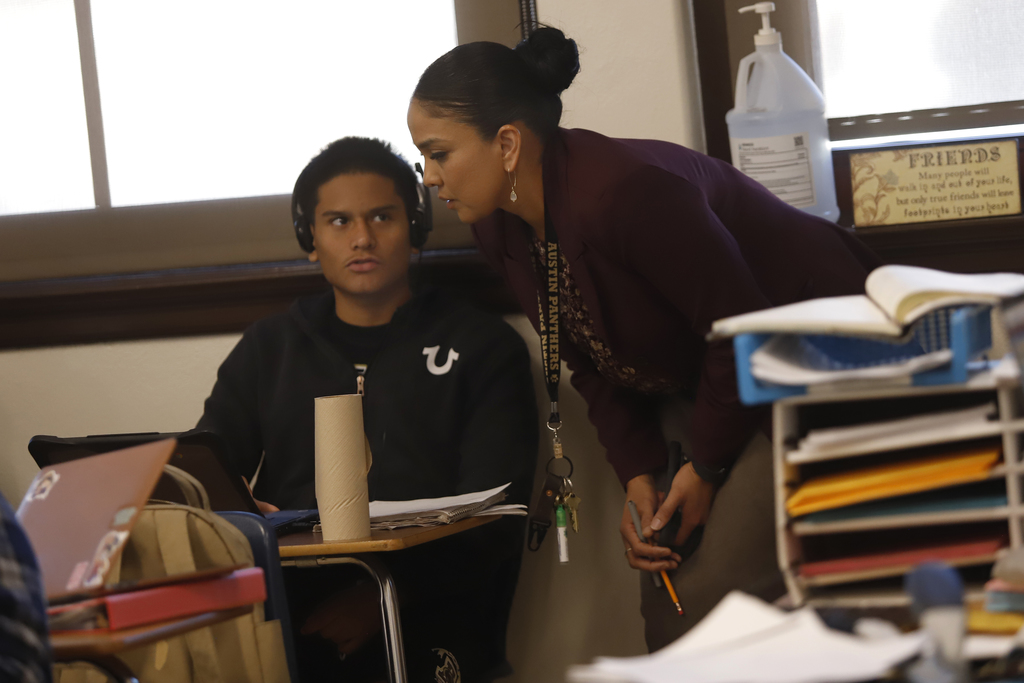 Austin High School principal talking with a student