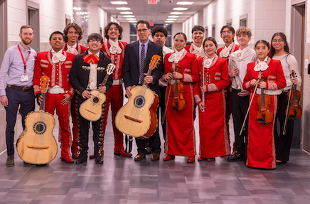 Superintendent Dr. Brian Lusk takes a group photo with the Jefferson Silva High School mariachi program
