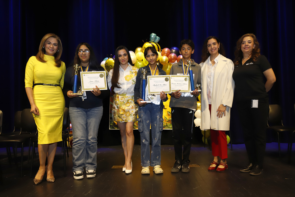 El Paso ISD students who earned top spots in the District Spanish Spelling bee take a group photo with judges
