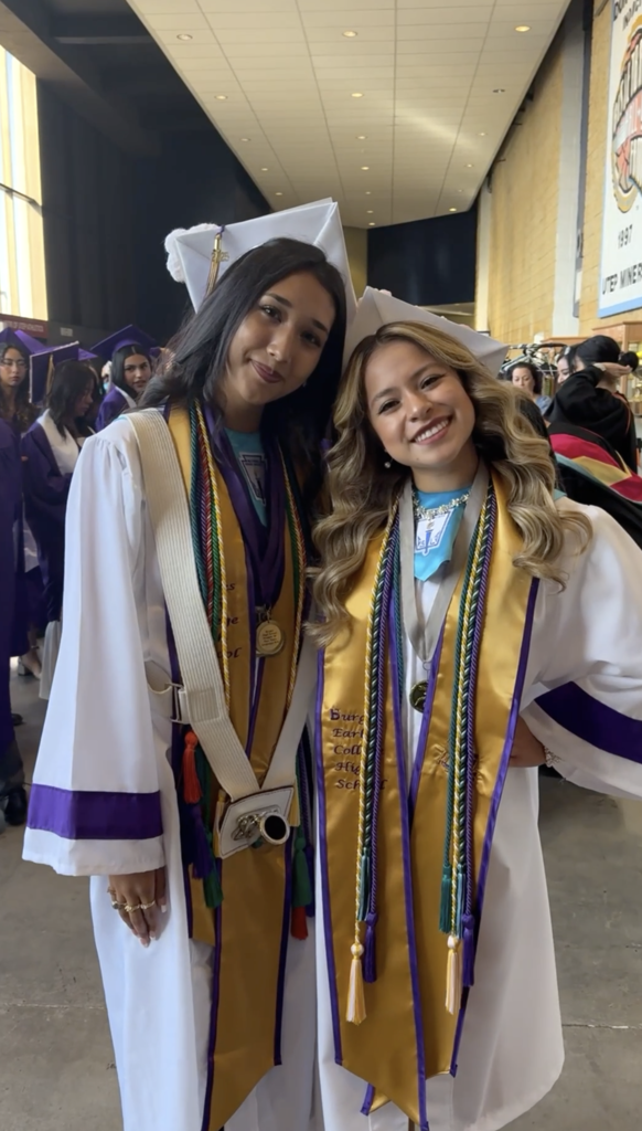 Two Burges graduates smiling for a photo