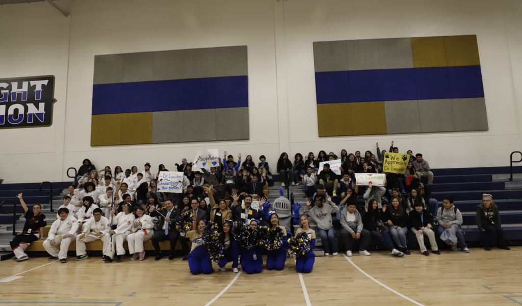 Dr. Jack Loveridge takes group photo with Navarette Middle School staff and students at pep rally