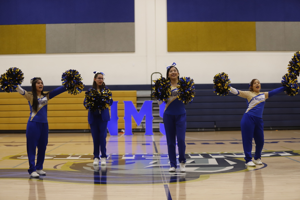 Navarette Middle School cheer performing