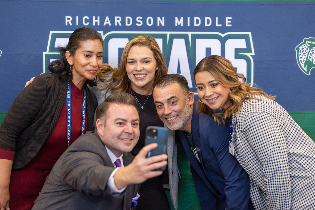 Trustee Robert Osterland with Richardson Middle School and El Paso ISD staff