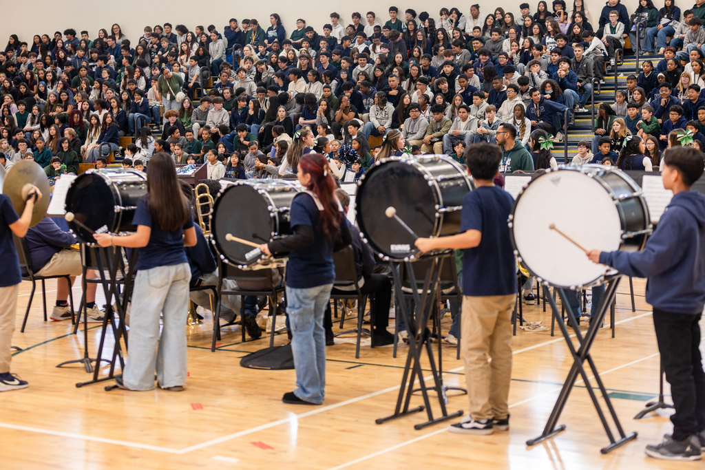 Richardson Middle School cheerleaders drumline playing at pep rally