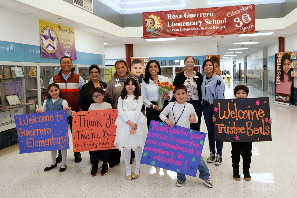 Guerrero Elementary School students and staff take group photos with Trustee Valerie Ganelon Beals