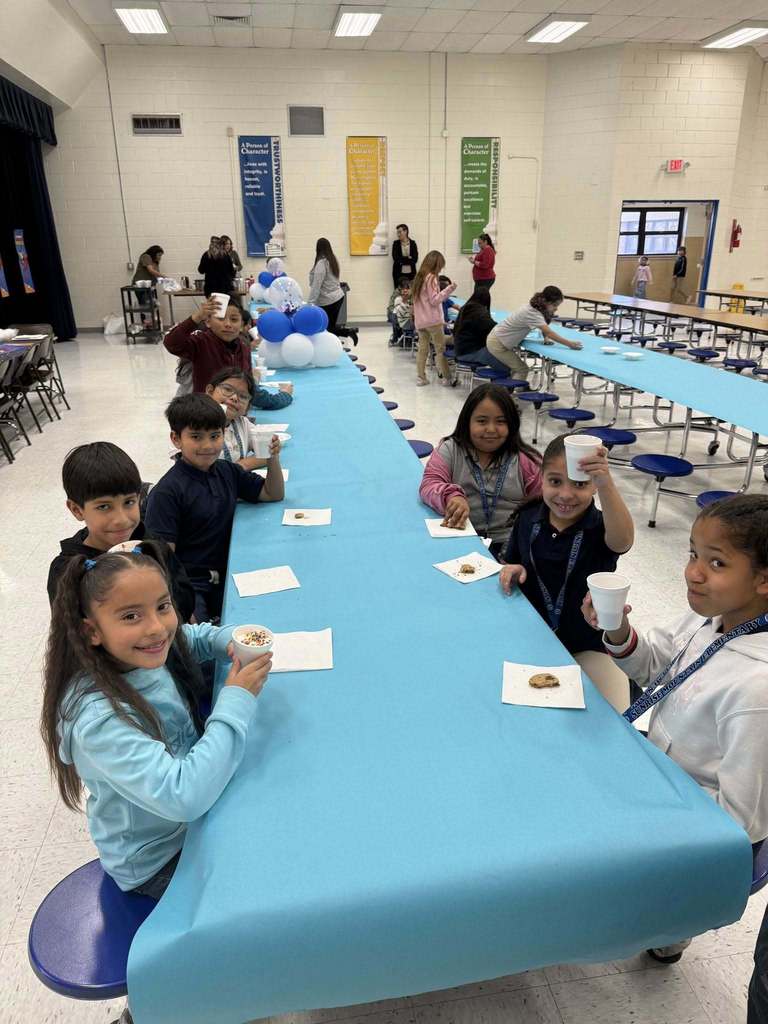 Sunrise Mountain Elementary School students enjoy cookies for perfect attendance