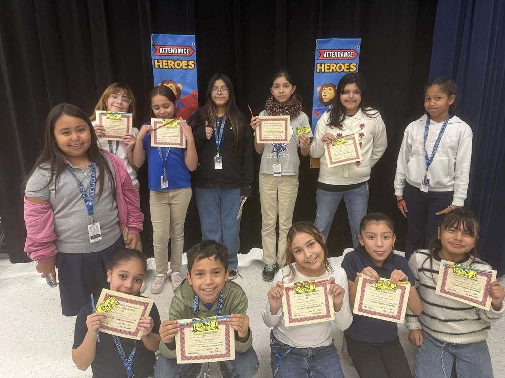 Sunrise Mountain Elementary School students show off perfect attendance certificates