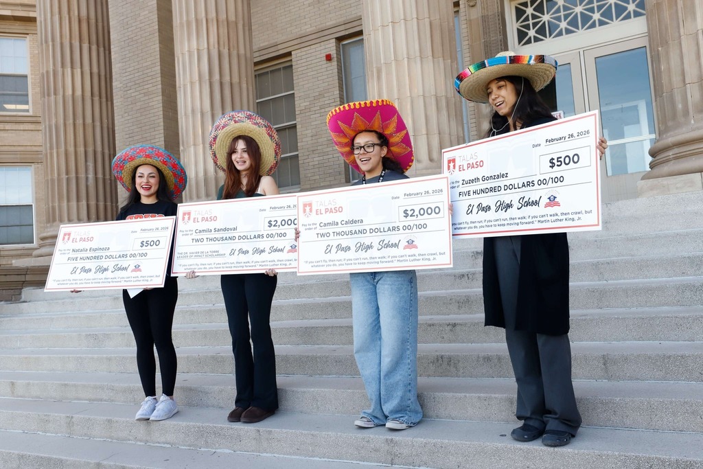 El Paso High School TALAS Recipients take group photo with giant scholarship checks