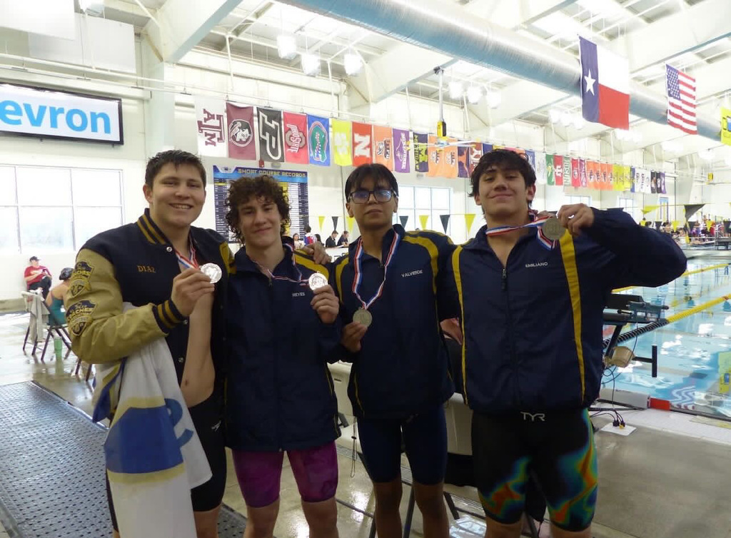 Coronado High School State Qualifier Swimmers smile for a photo