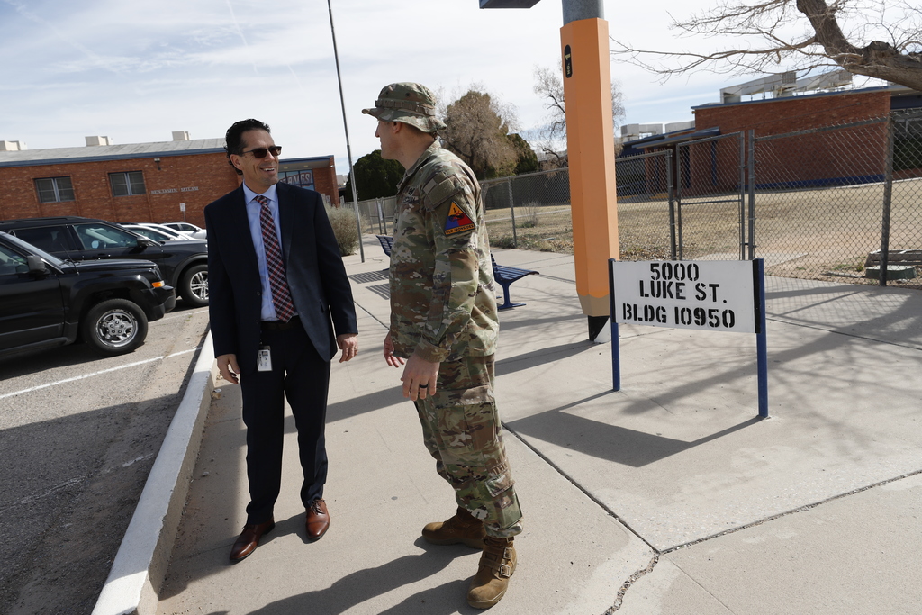 El Paso ISD Superintendent Dr. Brian Lusk and Garrison Commander Col. Michael Soyka talking in front of Milam Elementary School