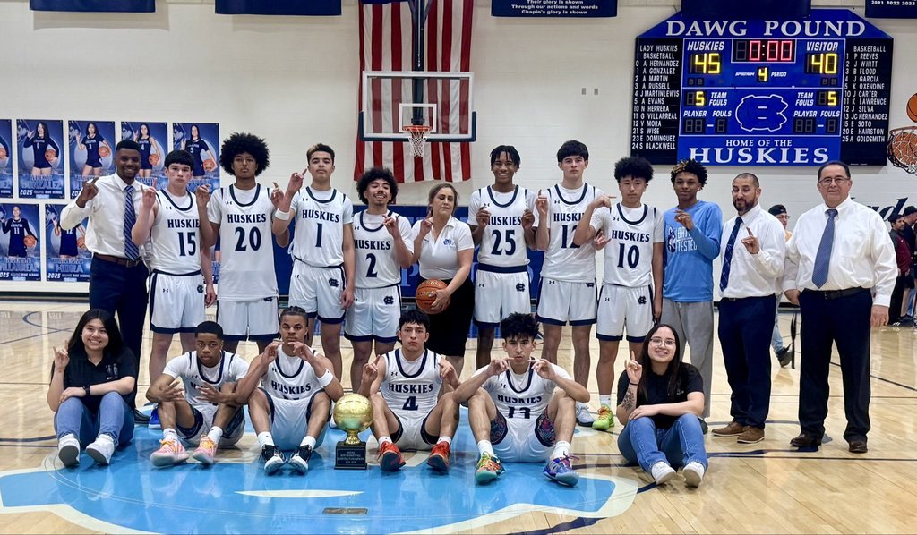 Chapin boys basketball team takes group photo with bi-district trophy