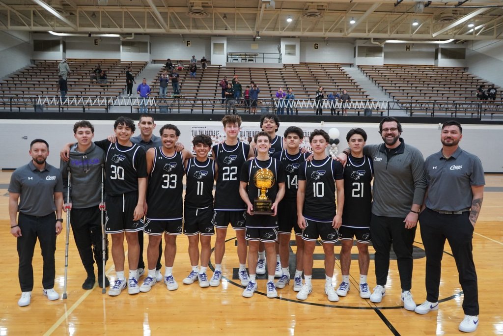 Franklin boys basketball team takes group photo with bi-district trophy