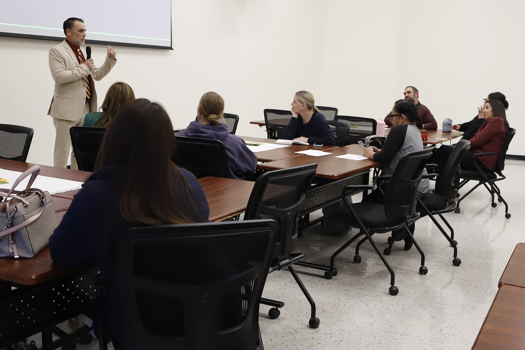 Trustee Robert Osterland speaks at Andress High School Community Conversations meeting