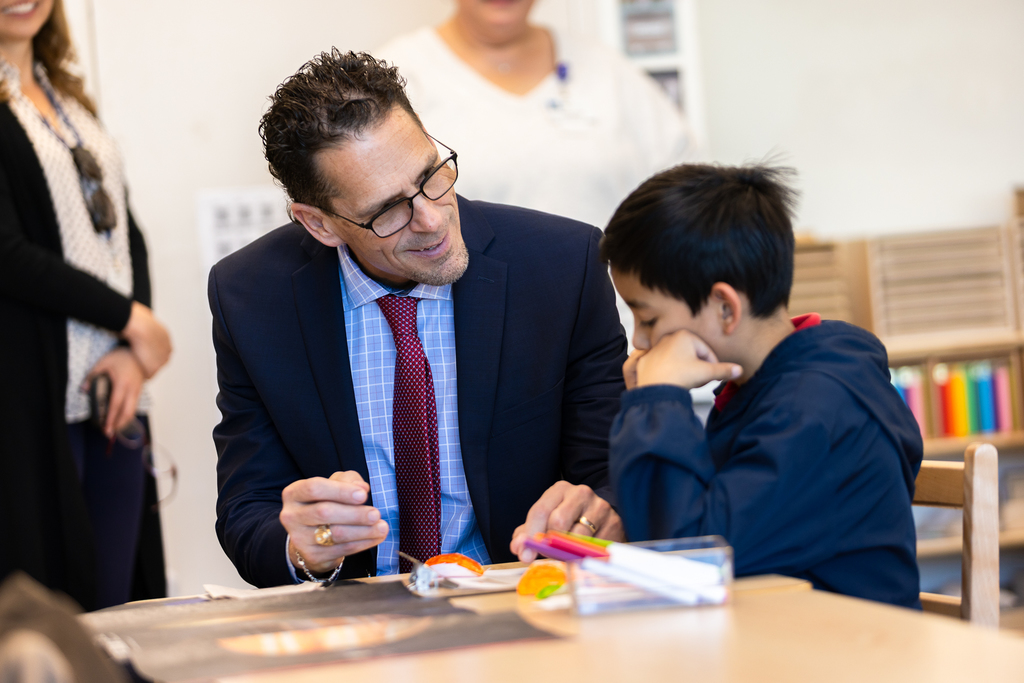 Moreno Montessori student receives help from Superintendent Dr. Brian Lusk