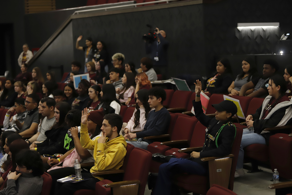 Andress, Chapin, and Irvin students at the In The Zone Northeast Career Event listening to presentations and raising hands