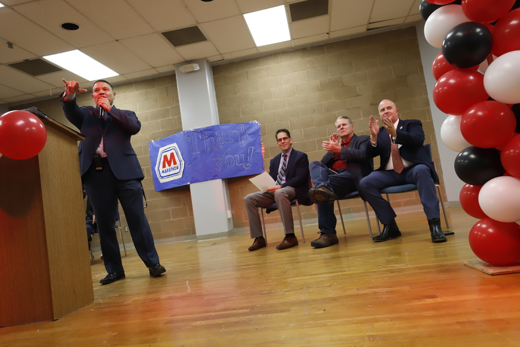 Principal Edgar Rincon giving a speech