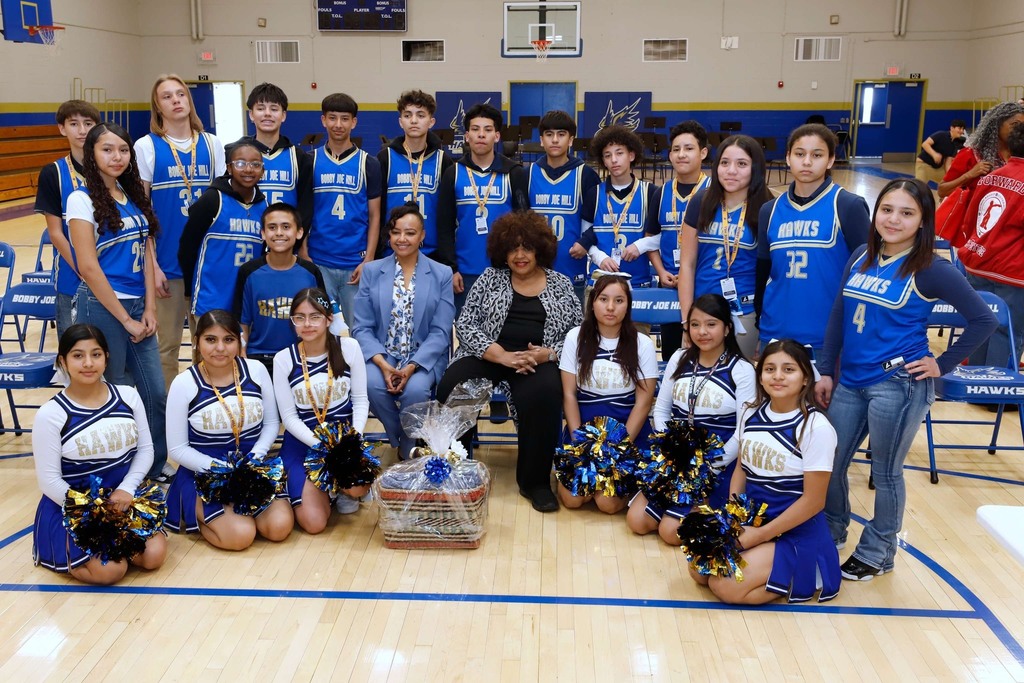 Hill PK8 students take group photo with Bobby Joe Hill's family