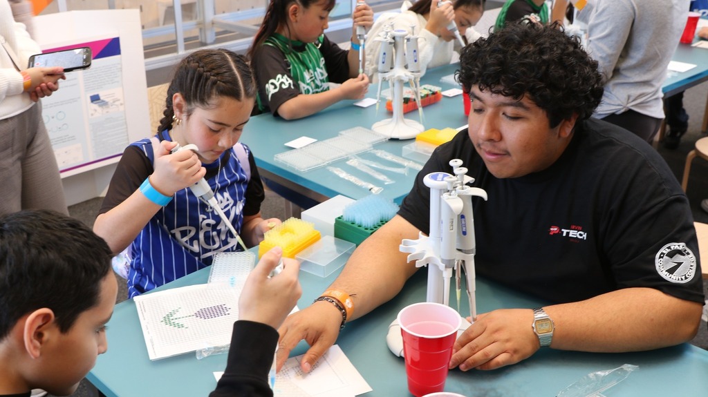 Irvin High School student helps children with fun activity