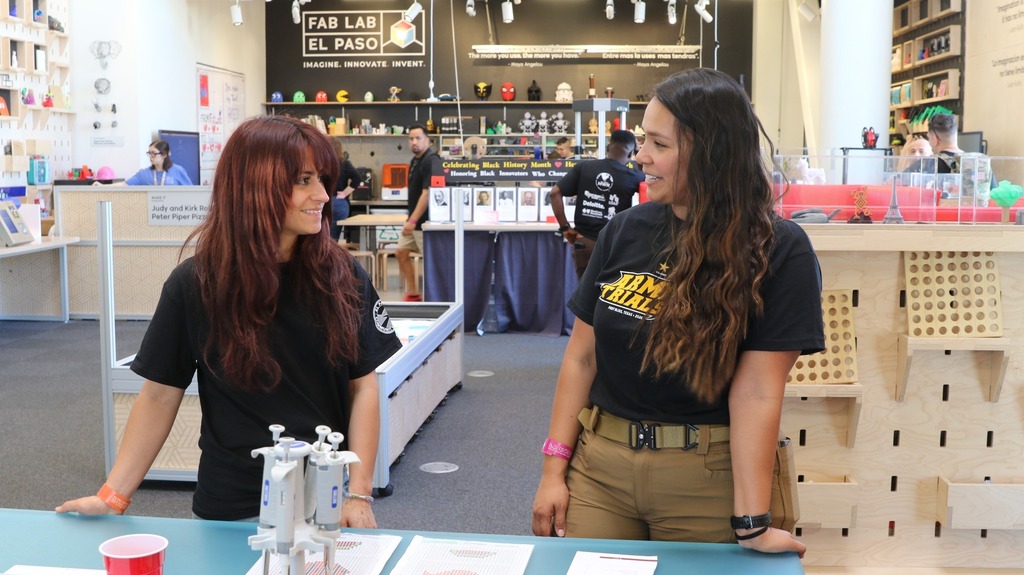 Irvin High School student speaks to community member about what the school is teaching children today
