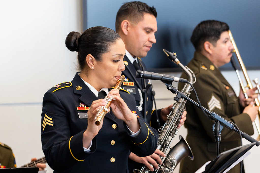 Military performer playing flute