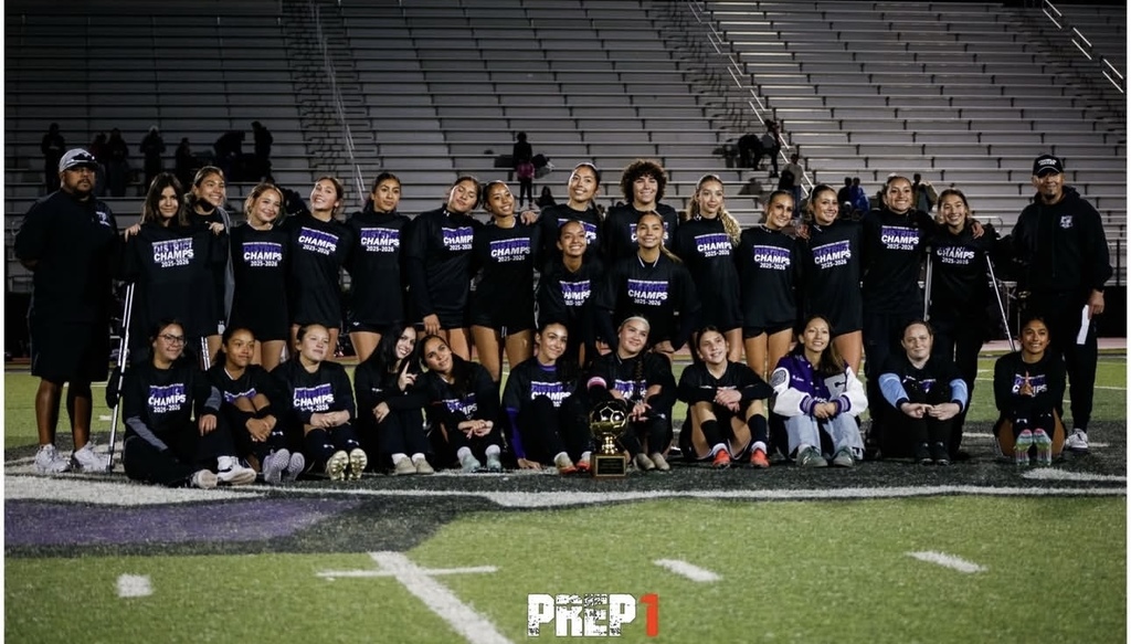 Franklin High School Girls Soccer Team takes group photo with their District Champions Trophy