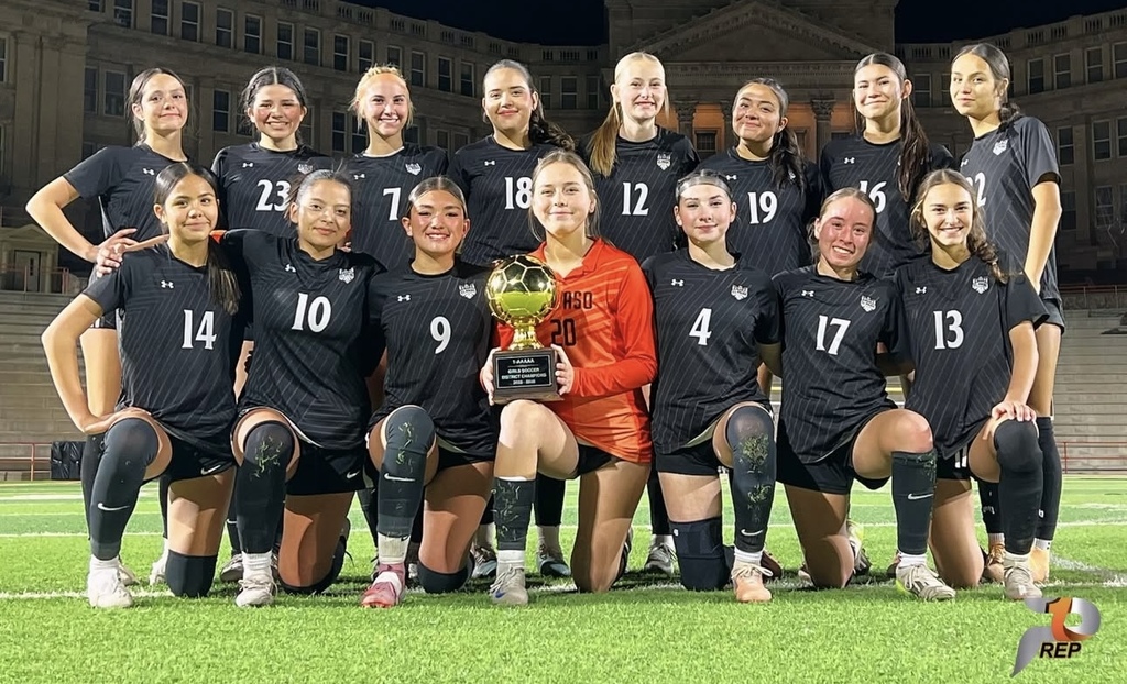 El Paso High School Girls Soccer Team takes group photo with their District Champions Trophy