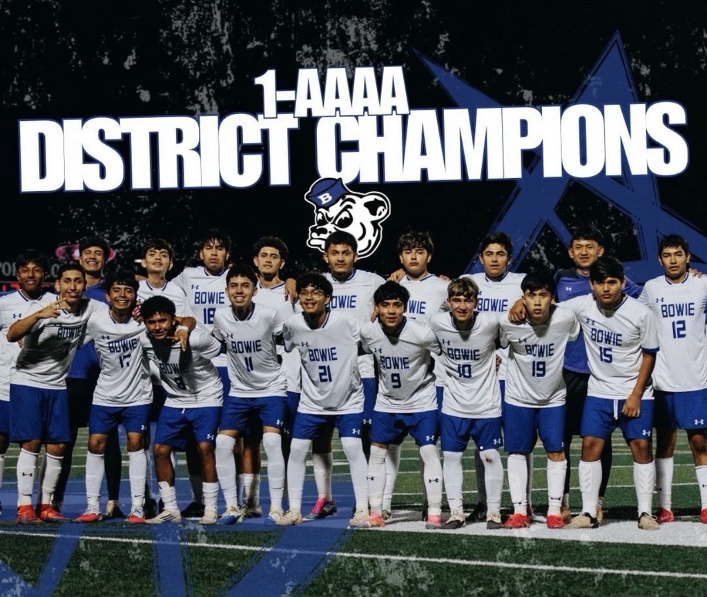 Bowie High School Boys Soccer Team takes group photo with their District Champions Trophy