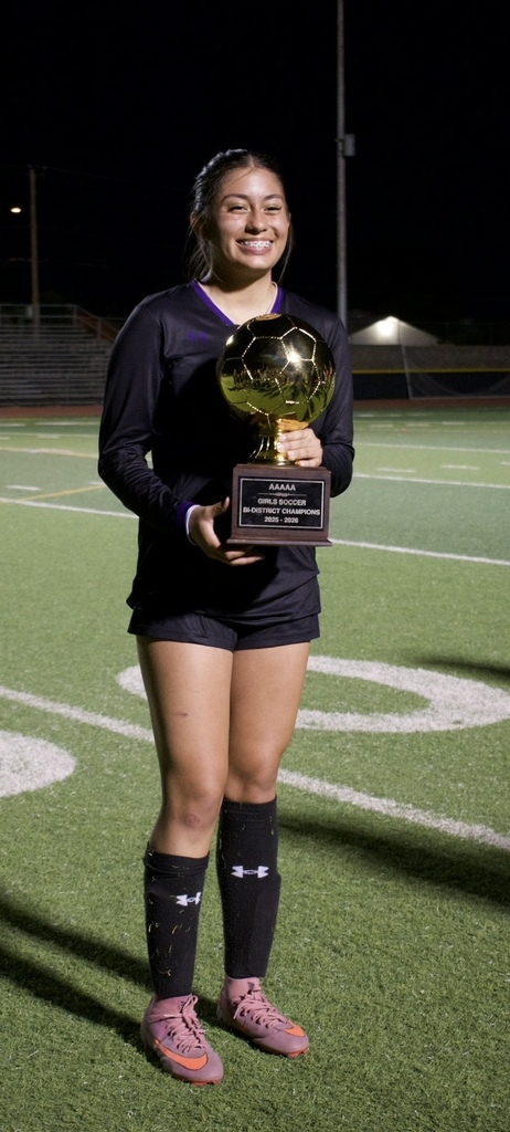 Photo of Amber Barron, Burges soccer holding trophy