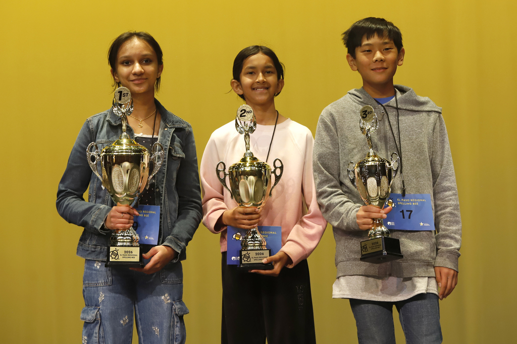 Photo of spelling bee champion Shaheli De Silva of Young Women's STEAM Research and Preparatory Academy and Anaya Tonde of Tippin Elementary with 3rd place winner