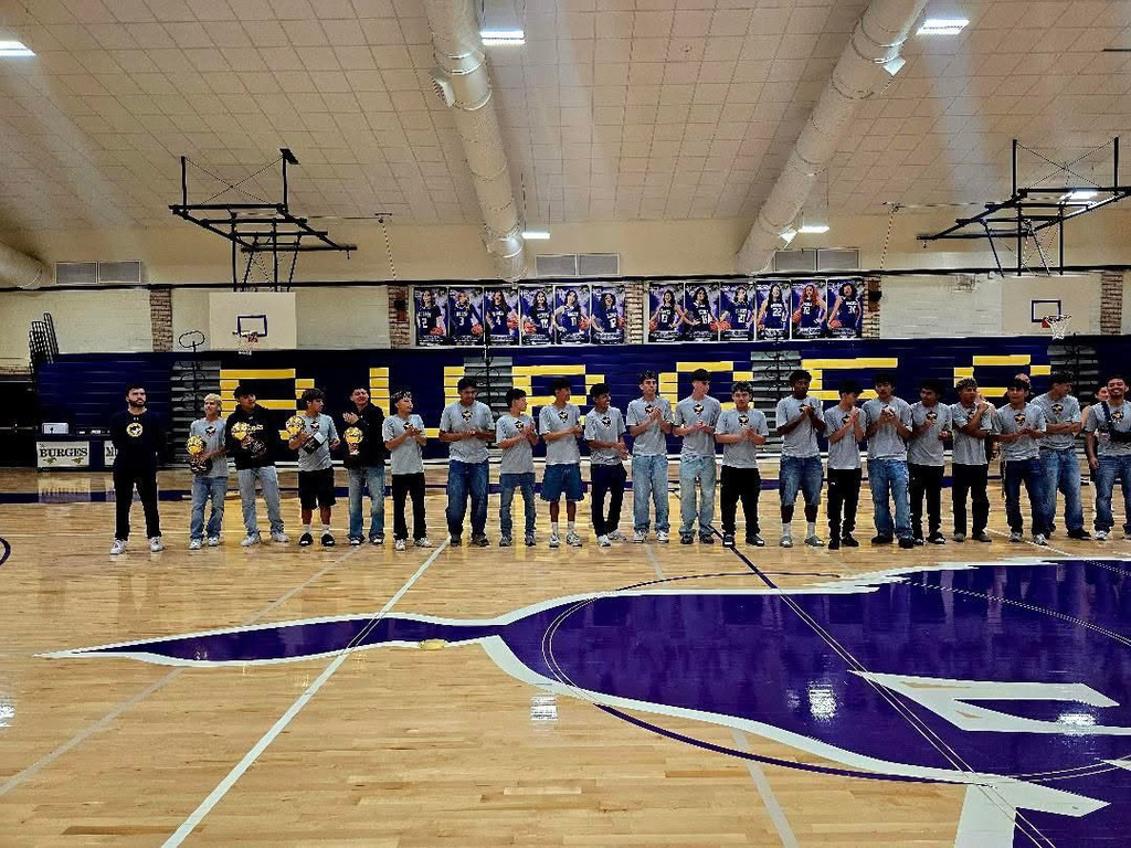 Burges High School boys soccer team and coach clapping during send off celebration
