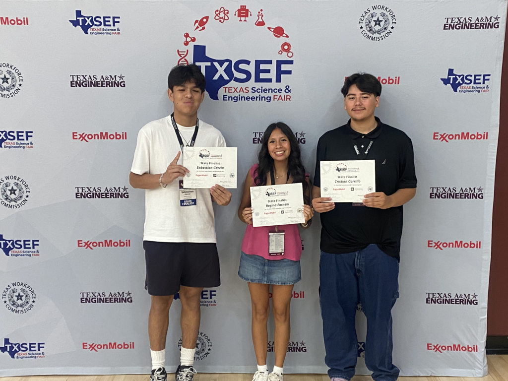 Three El Paso ISD students take group photo at the Texas Science and Engineering Fair in College Station, Texas