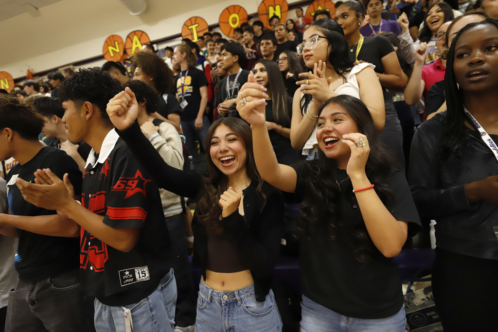  Burges students and staff cheer on their varsity boys soccer team during a pep rally celebrating the team heading out to the Final Four State Playoffs
