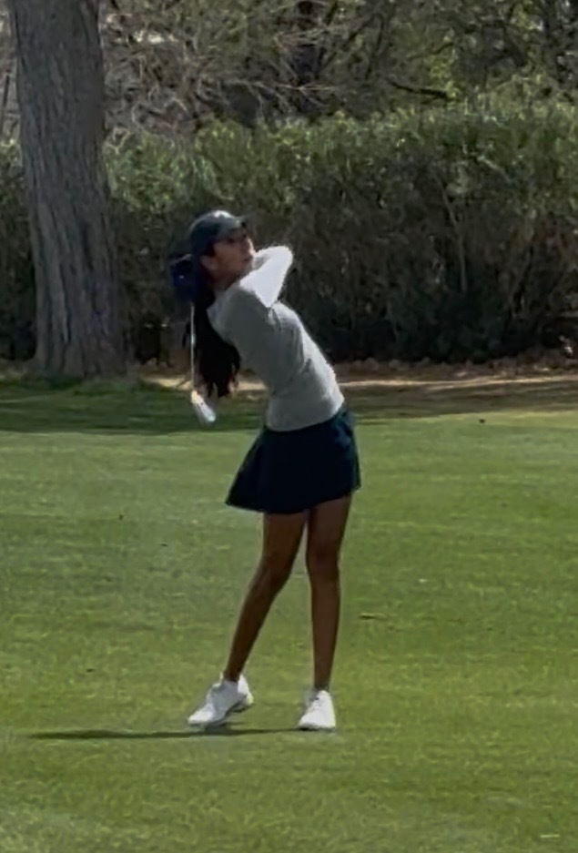 Action shot of Natalia Velasquez, Coronado golf playing golf