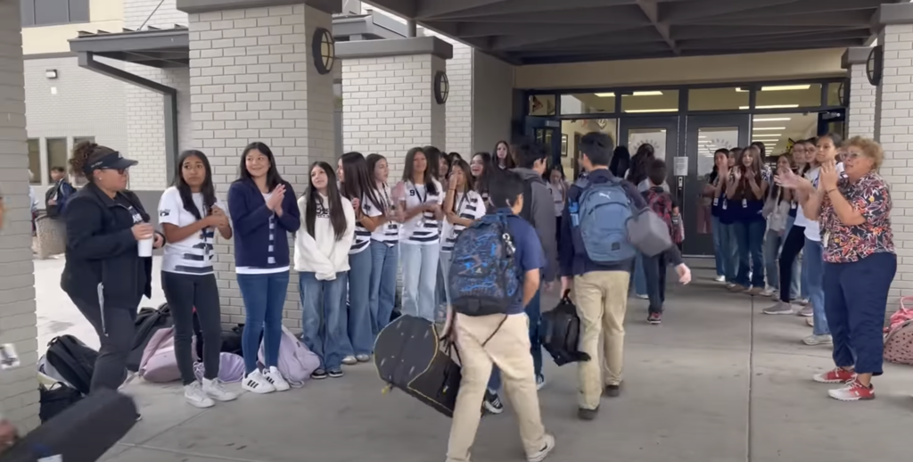 Hornedo girls socer teams welcomes students into school