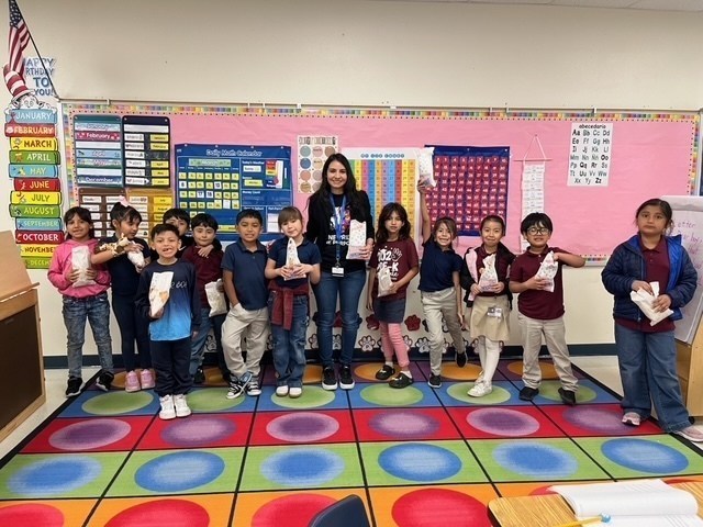 Students smiling with popcorn