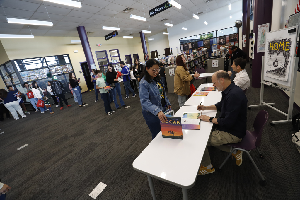 El Paso ISD families get books signed by authors