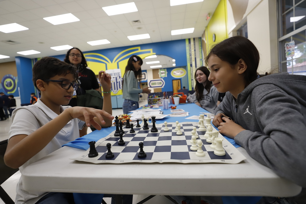 Guillen Middle School students playing chess