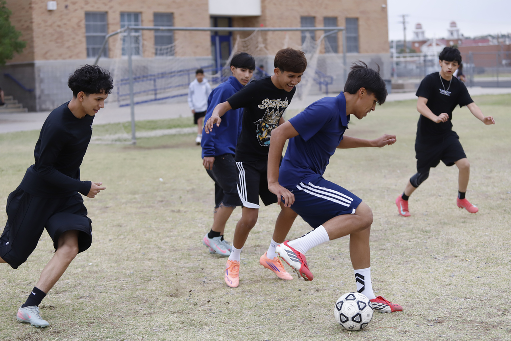 Guillen Middle School students playing soccer