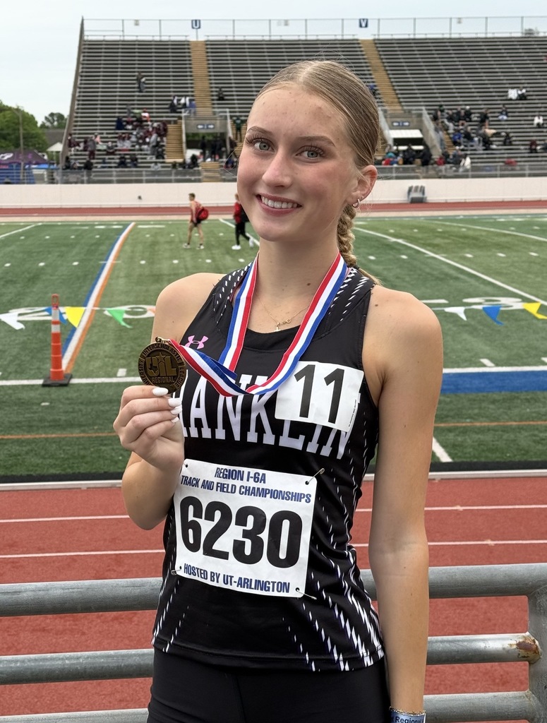 Photo of Franklin High School track and field state qualifier holding medal