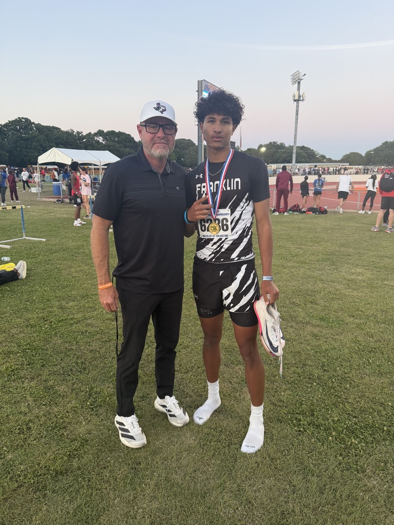 Photo of Franklin High School track and field state qualifier with coach
