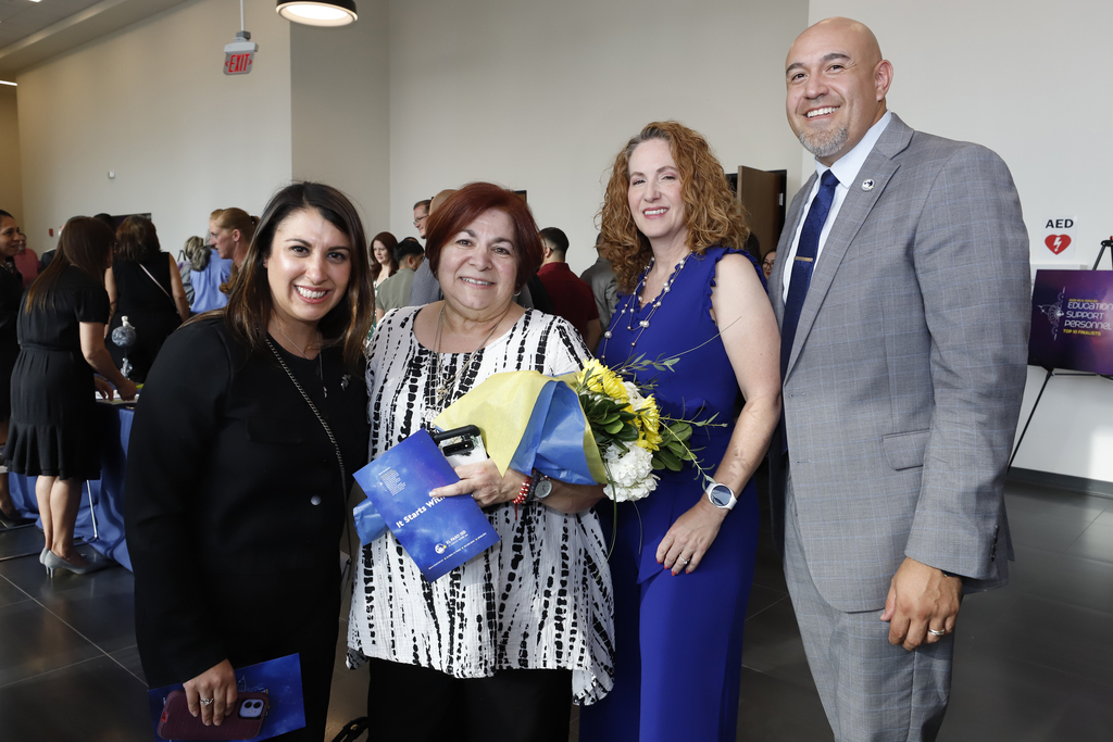 El Paso ISD staff and Trustee Alex Cuellar take group photo