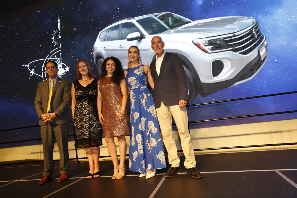 Rudolph Auto Group and Superintendent Dr. Brian Lusk take group photo with Jasmine Gallardo from Telles Academy after she won one-year vehicle lease for a 2026 Volkswagen Atlas 