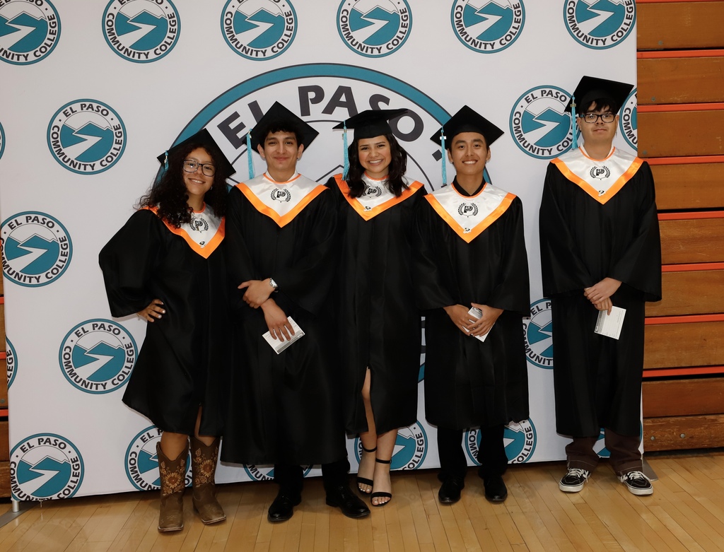 El Paso High School graduate take group photo at EPCC graduation