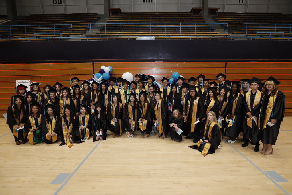 Burges High School students smile for a group photo before their EPCC Graduation Ceremony