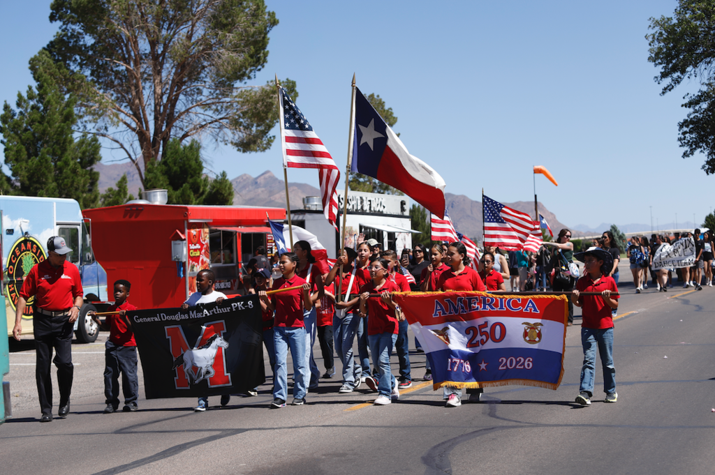 MacArthur PK-8 students and staff participating in Armed Forces Parade