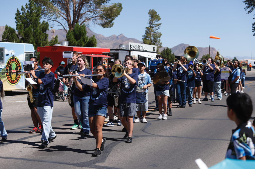 Chapin High School band students and staff participating in Armed Forces Parade